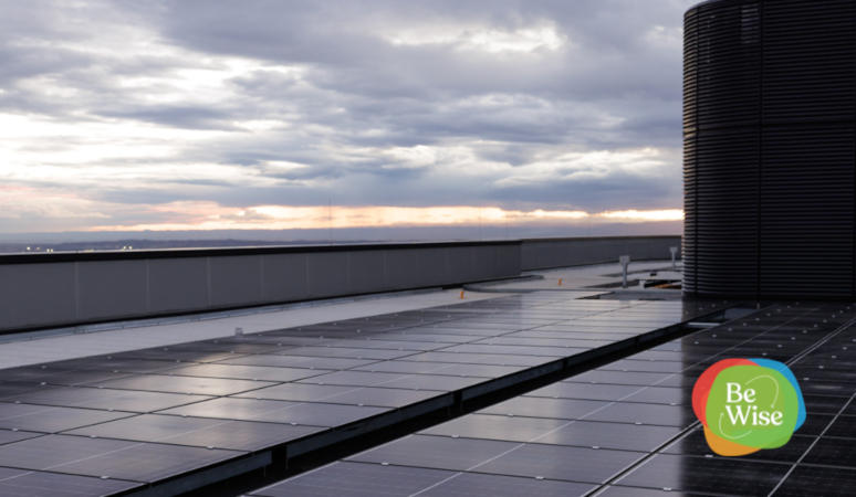Rooftop solar panels at Parramatta Square during dusk, featuring a cloudy sky with subtle sunset hues.